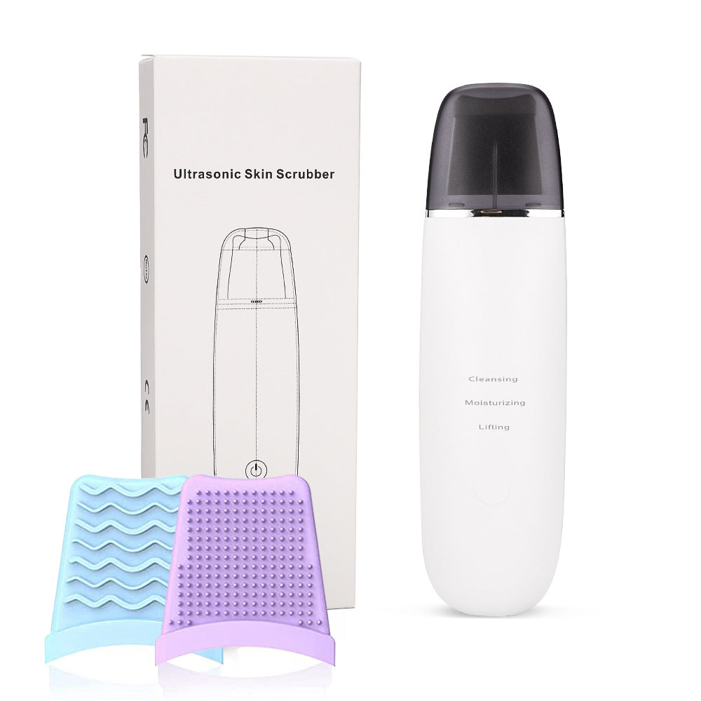 Ultrasonic skin scrubber with packaging and attachments on a white background